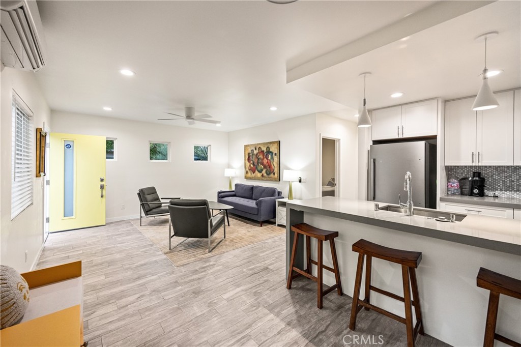 435 East Chuckwalla Road Palm Springs, CA 92262 - Photo 19 of 24 a large kitchen with a table and chairs