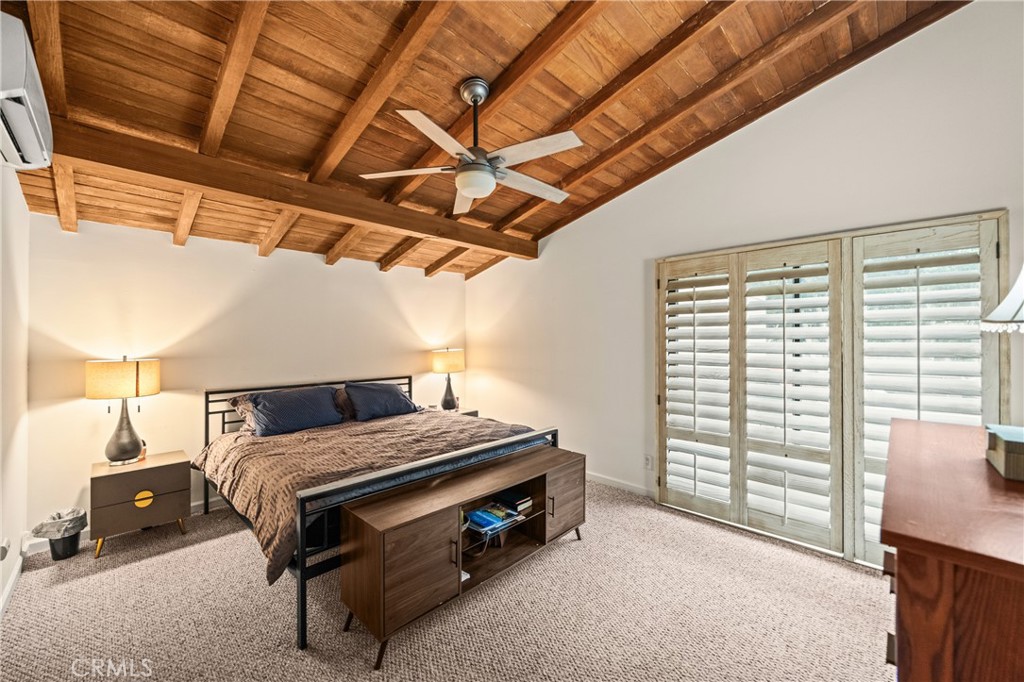 435 East Chuckwalla Road Palm Springs, CA 92262 - Photo 10 of 24 a bedroom with a bed and a window