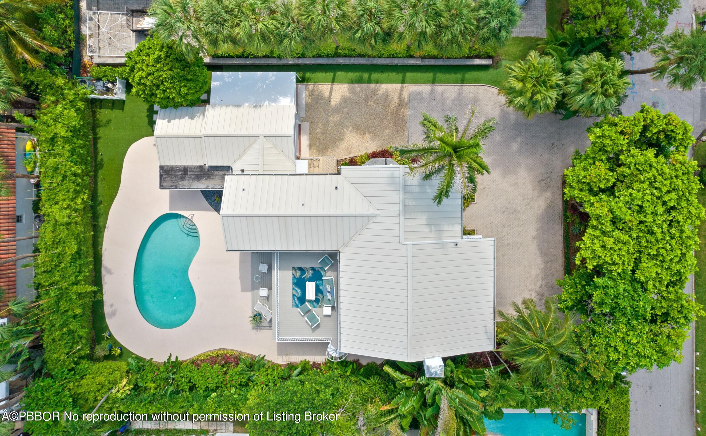 323 Arabian Road Palm Beach, FL 33480 - Photo 18 of 21 an aerial view of a house with garden space and swimming pool