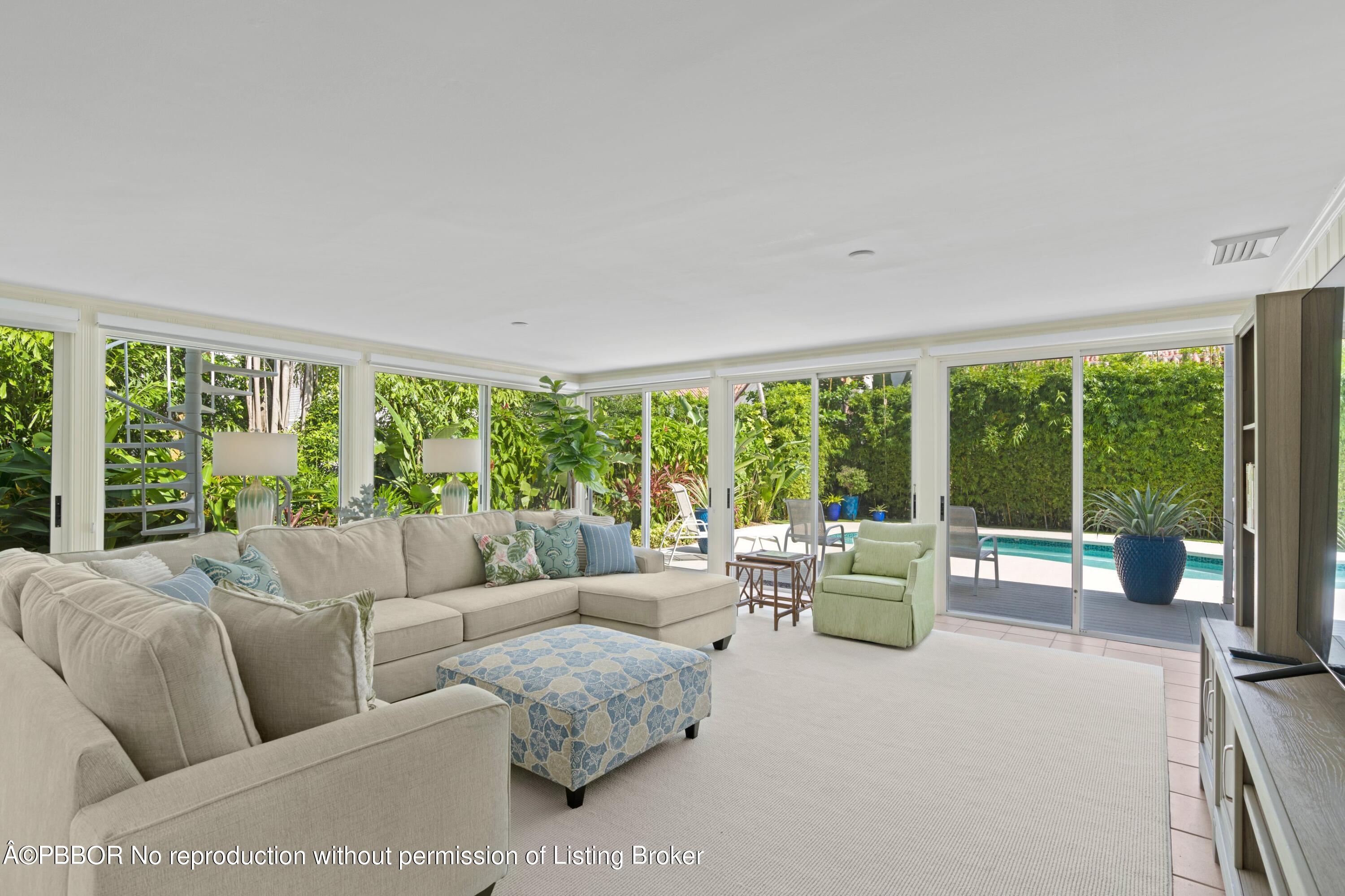 323 Arabian Road Palm Beach, FL 33480 - Photo 6 of 21 a living room with furniture and a large window