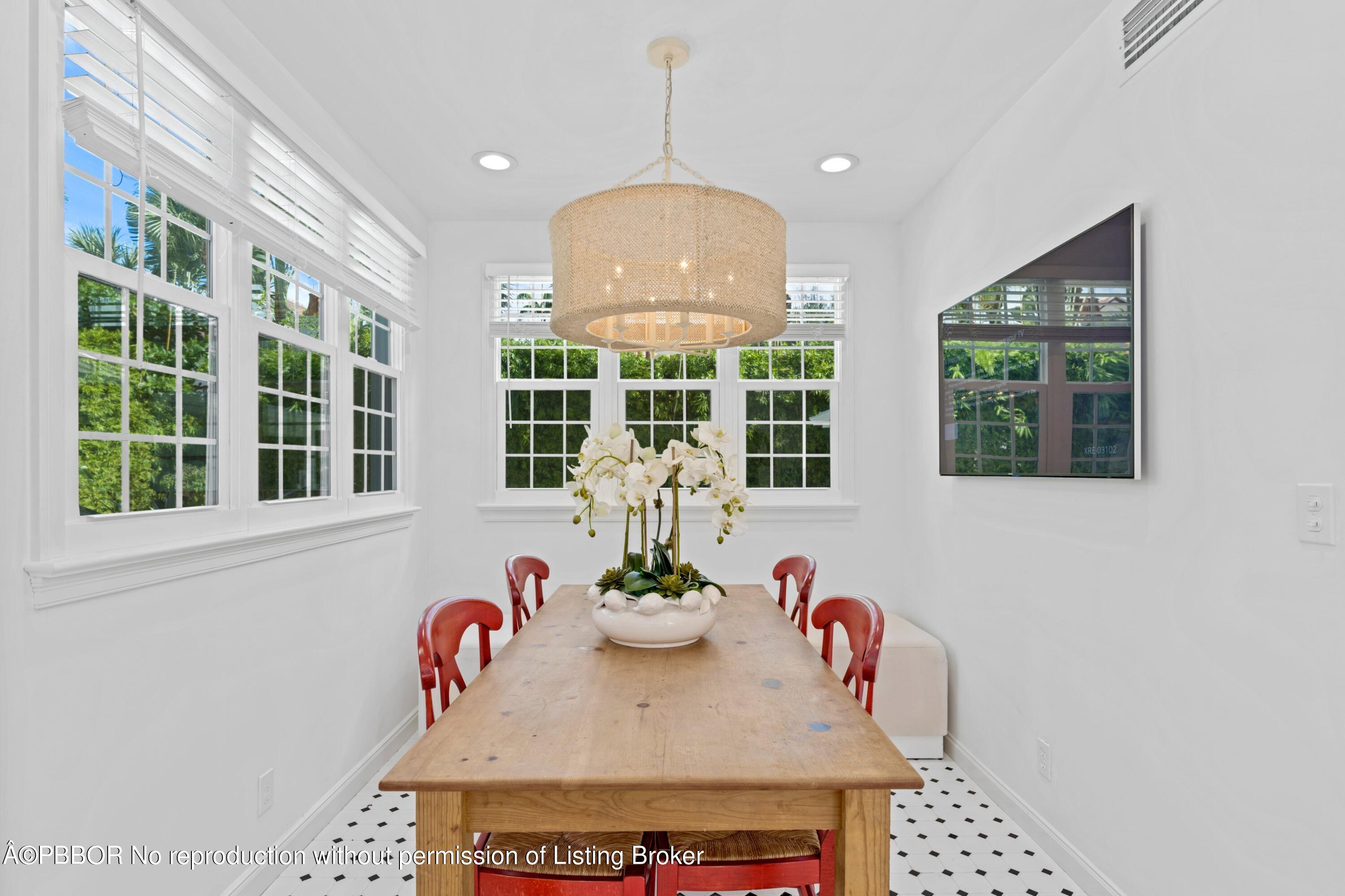 323 Arabian Road Palm Beach, FL 33480 - Photo 8 of 21 a view of a dining room with furniture window and outside view