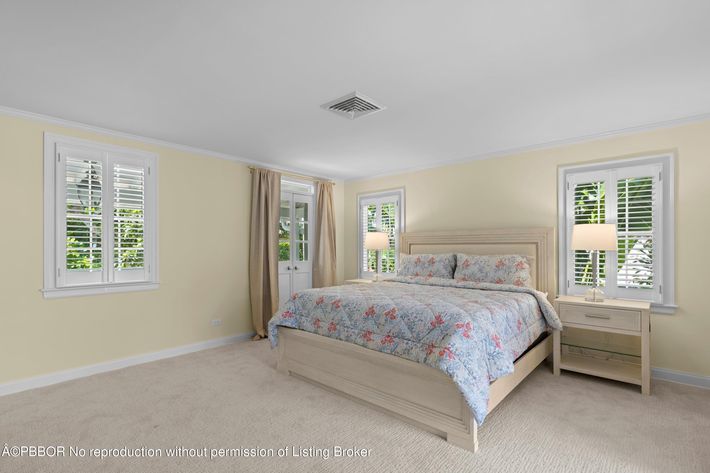 323 Arabian Road Palm Beach, FL 33480 - Photo 10 of 21 a bedroom with a bed and a window