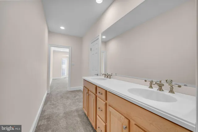 a view of a hallway view with staircase