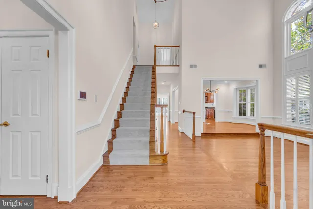 a view of entryway with wooden floor