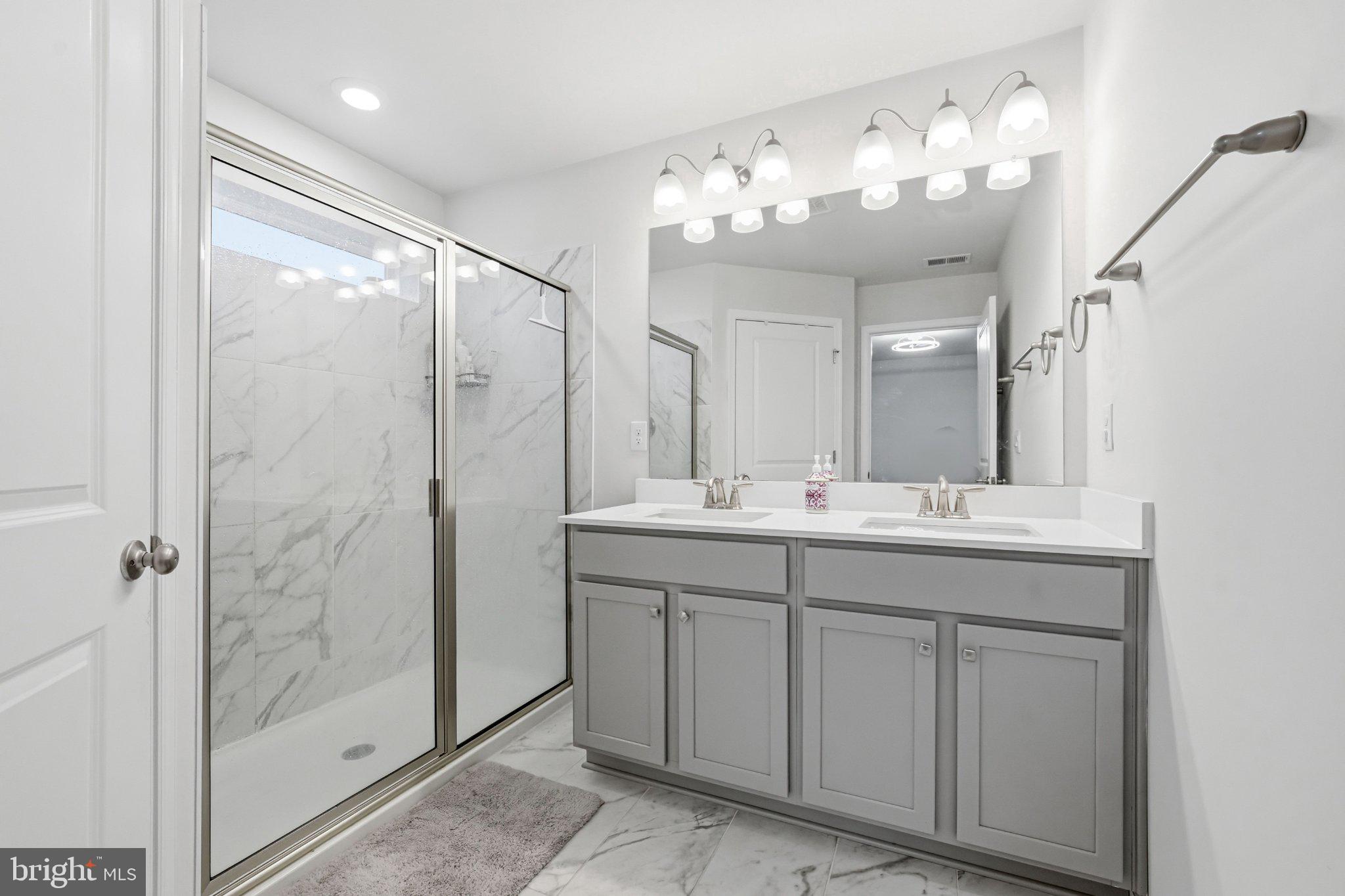 20 Sisters Farmstead Road Mount Laurel, NJ 08054 - Photo 34 of 39 Sleek modern bathroom with elegance.