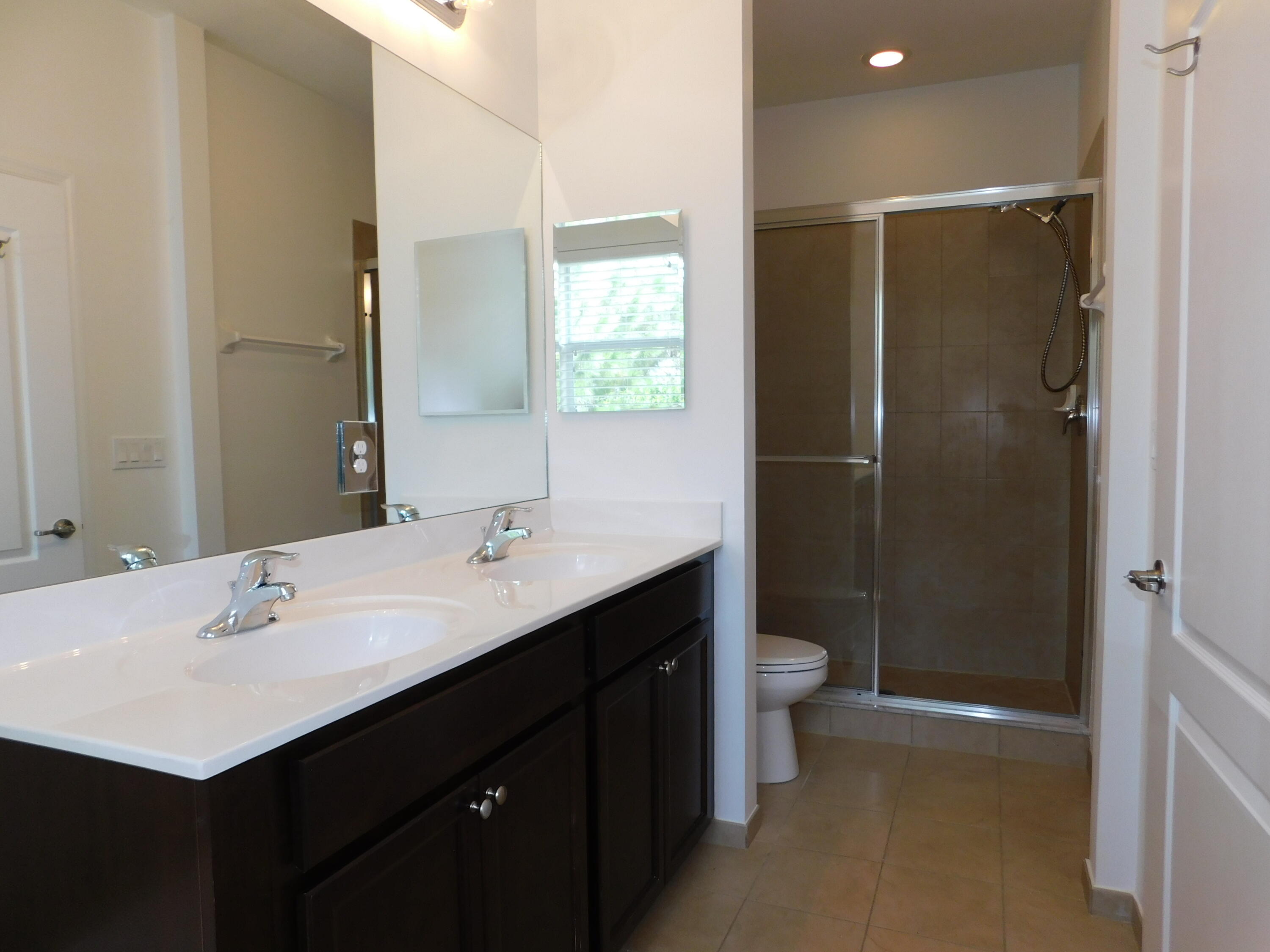 3091 Southwest Otter Lane Stuart, FL 34997 - Photo 14 of 28 Master Bedroom Bath