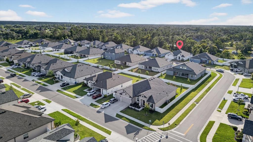 1237 Kelsa Anne Dr Spring Hill Spring Hill, FL 34609 - Photo 92 of 94 an aerial view of a house with a ocean view