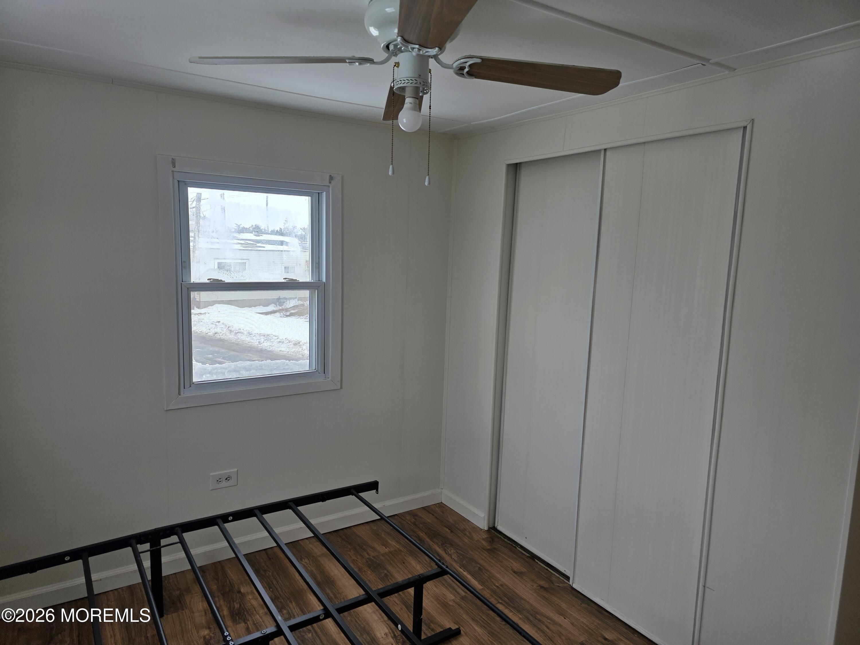 469 South Green Street, Unit 63 Tuckerton, NJ 08087 - Photo 9 of 11 a view of an empty room with a window