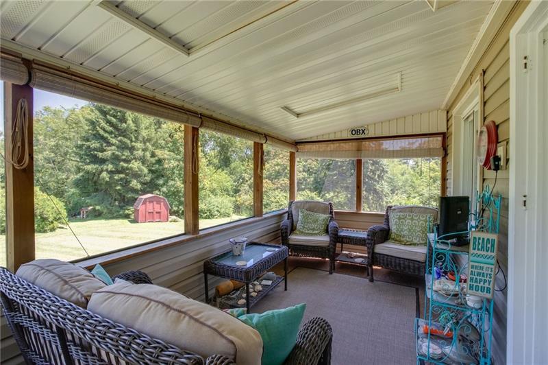 358 Holt Road Aliquippa, PA 15001 - Photo 4 of 20 Enjoy your evenings on the screened in side porch