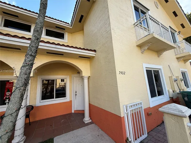 a view of front door and deck