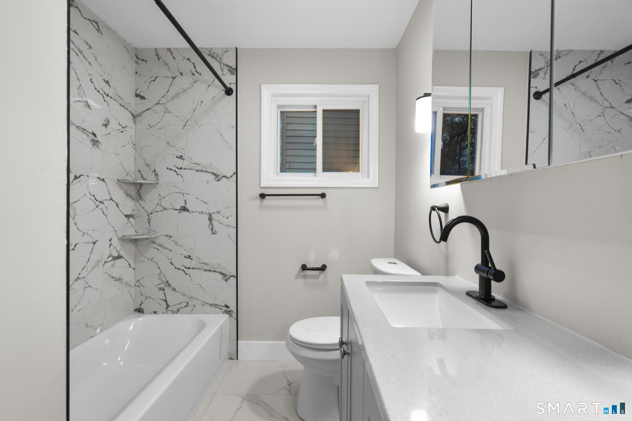 3 Highview Lane New Haven, CT 06513 - Photo 13 of 30 a bathroom with a sink toilet and shower