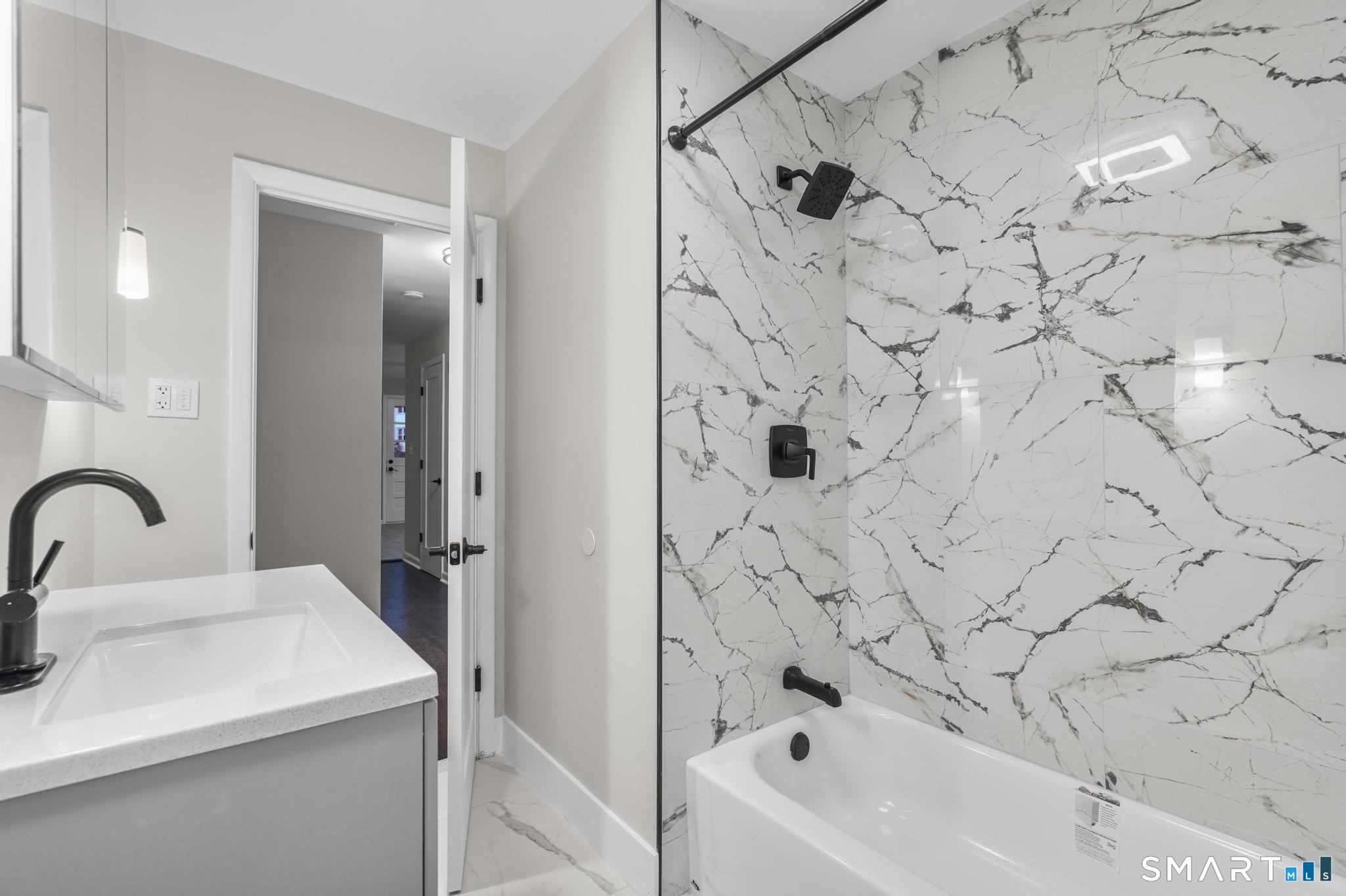3 Highview Lane New Haven, CT 06513 - Photo 15 of 30 a bathroom with a sink and shower