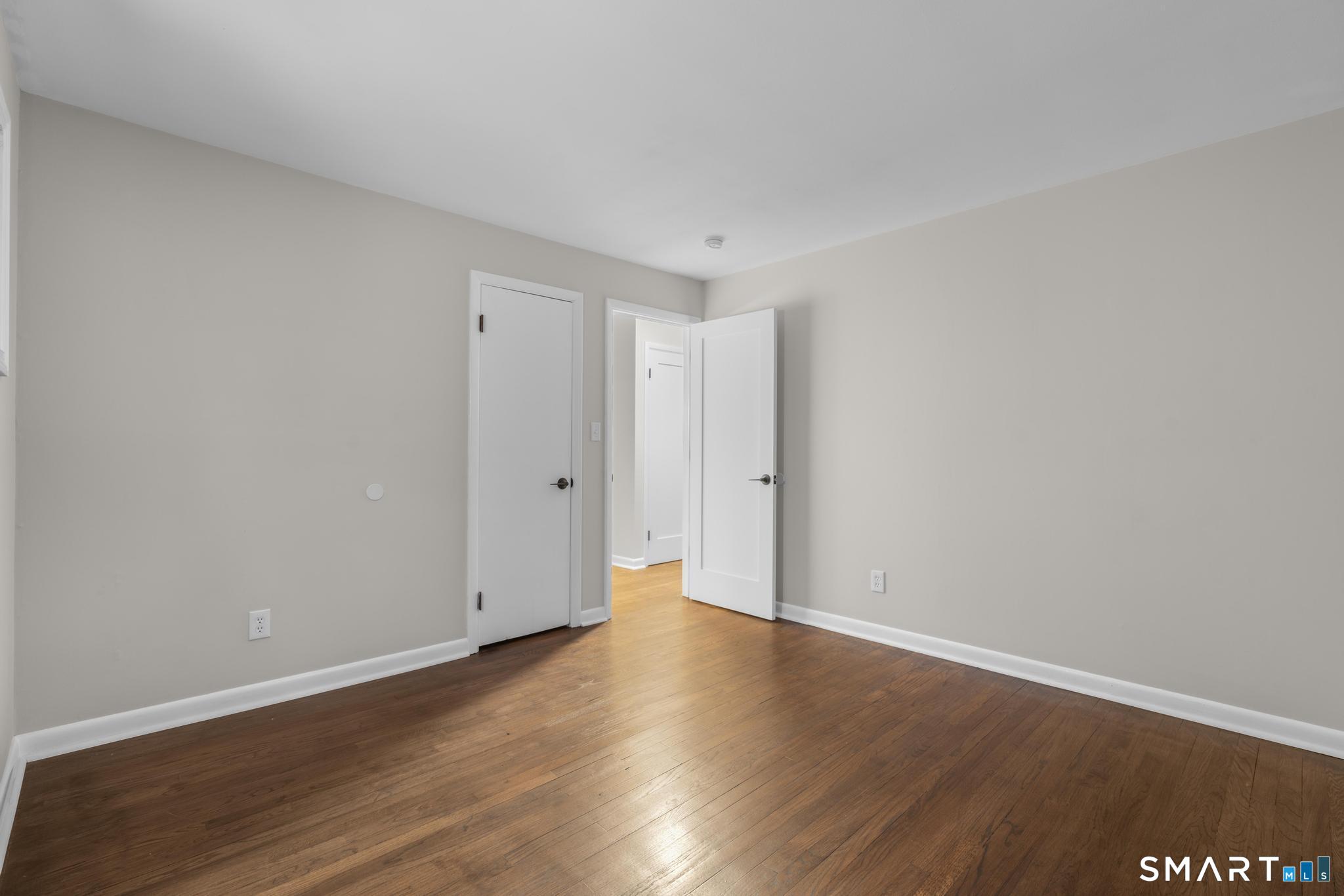 3 Highview Lane New Haven, CT 06513 - Photo 17 of 30 a view of an empty room with wooden floor