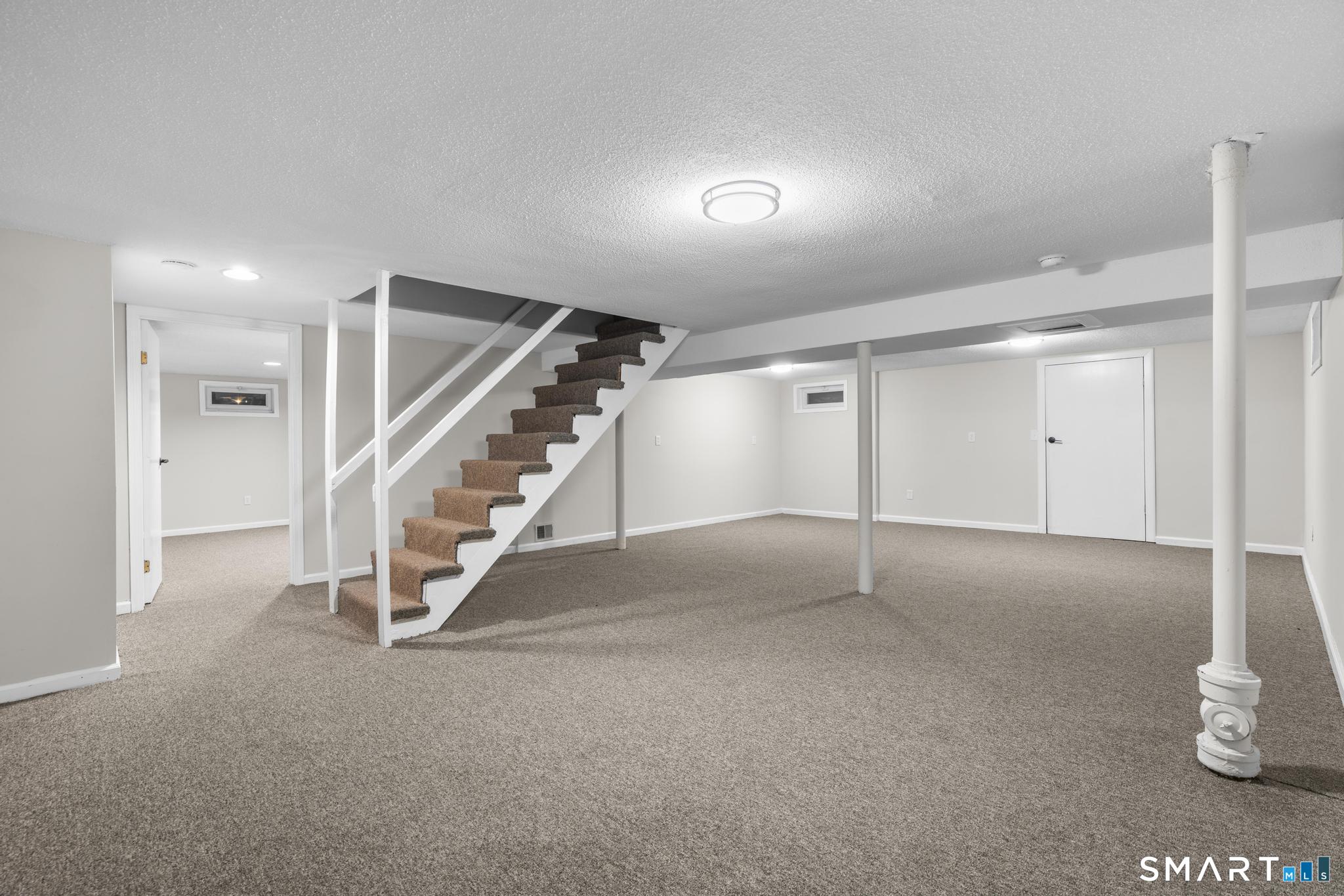 3 Highview Lane New Haven, CT 06513 - Photo 20 of 30 a view of an empty room with stairs