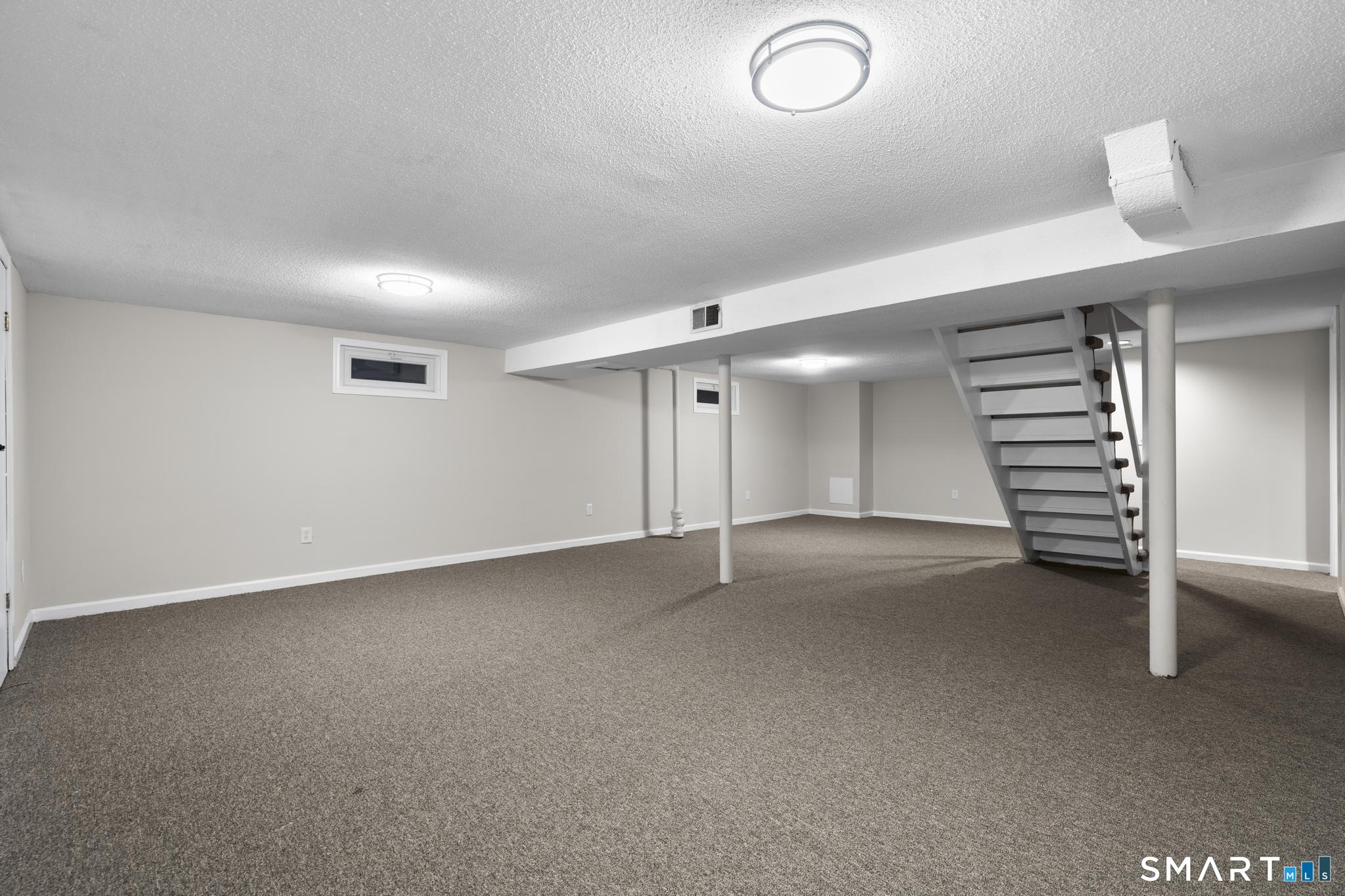 3 Highview Lane New Haven, CT 06513 - Photo 22 of 30 an empty room with a projector