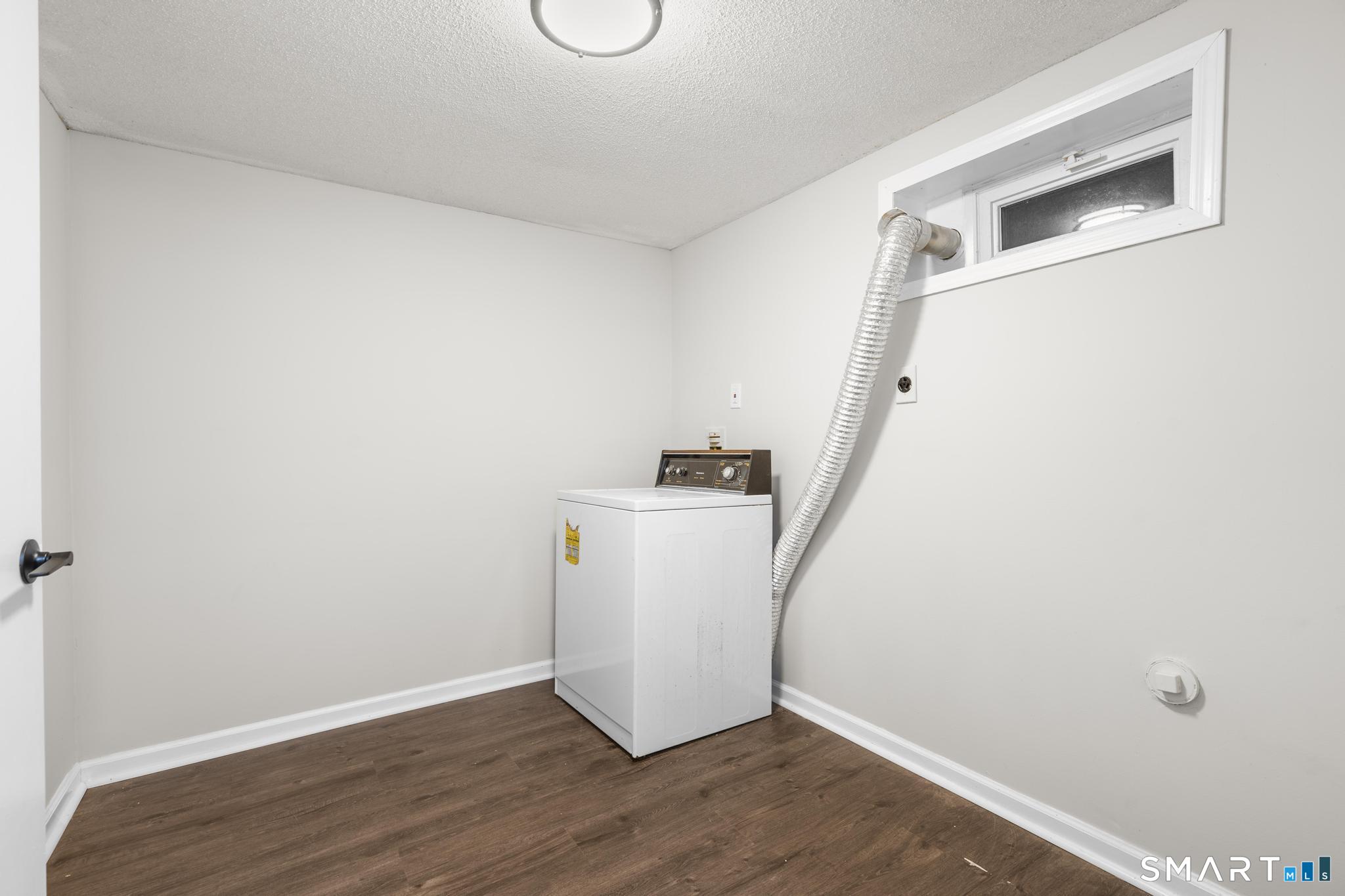 3 Highview Lane New Haven, CT 06513 - Photo 27 of 30 a view of a hallway with wooden floor and entryway