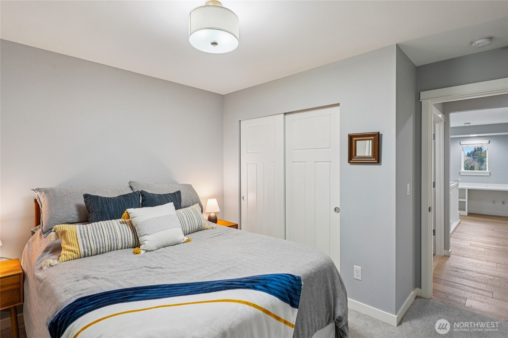 6523 128th Place Southwest Edmonds, WA 98026 - Photo 27 of 35 a bedroom with a bed and painting on the wall