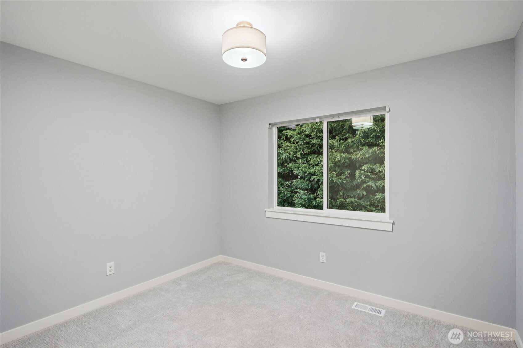 6523 128th Place Southwest Edmonds, WA 98026 - Photo 28 of 35 an empty room with a window