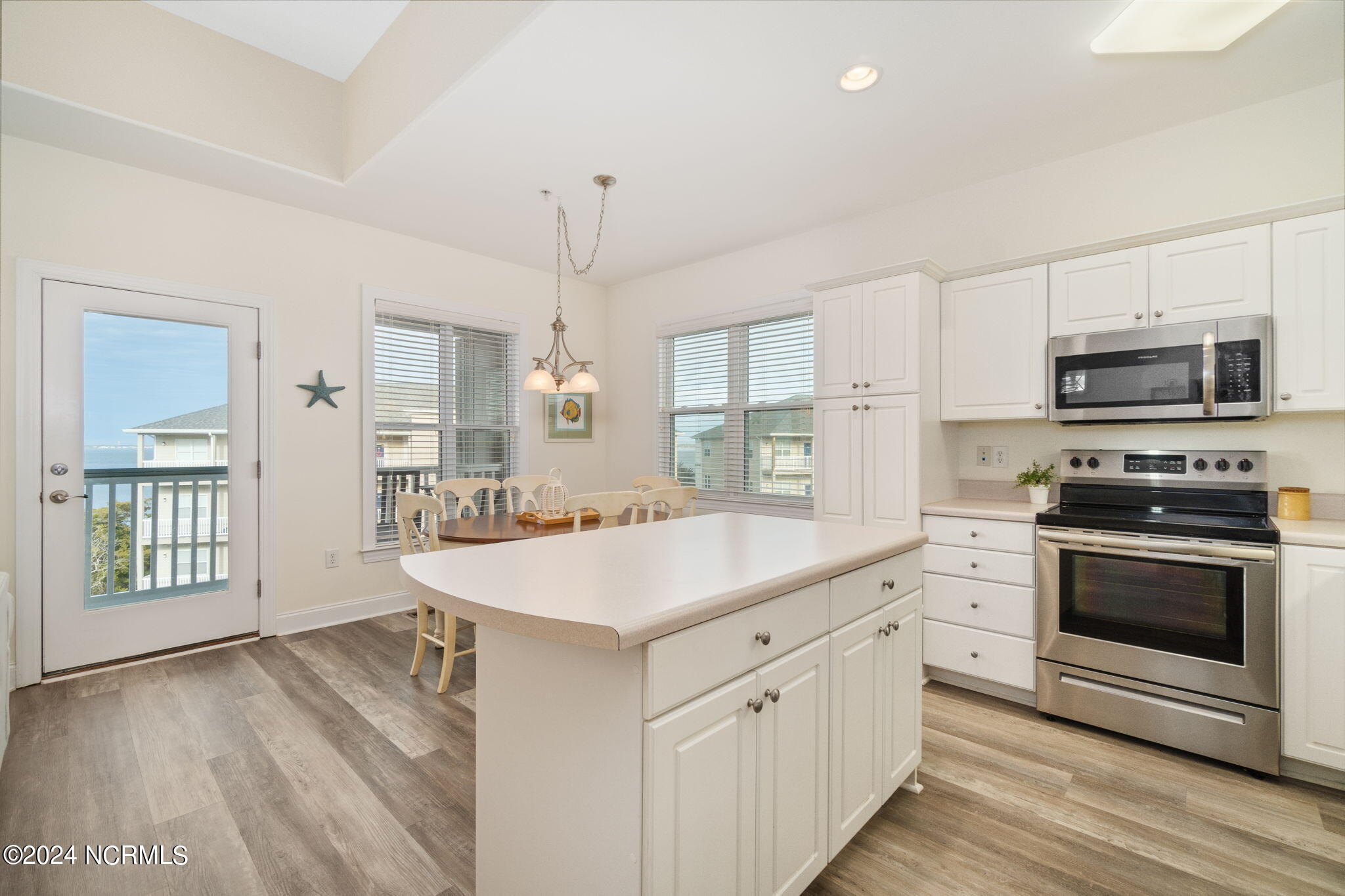 1700 Salter Path Road, Unit K304 Indian Beach, NC 28512 - Photo 6 of 56 Kitchen w/ island seating