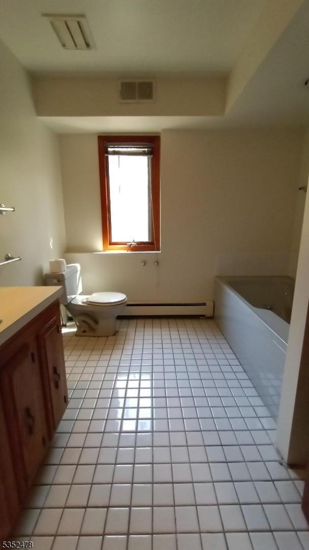 83 Lakeside Drive Vernon, NJ 07461 - Photo 12 of 34 a view of a kitchen with a sink