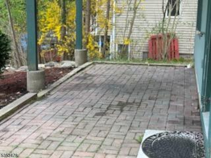 83 Lakeside Drive Vernon, NJ 07461 - Photo 2 of 34 a porch with seating space