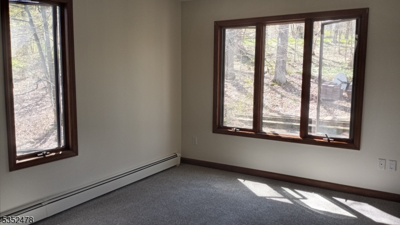 83 Lakeside Drive Vernon, NJ 07461 - Photo 27 of 34 a view of a room that has a window