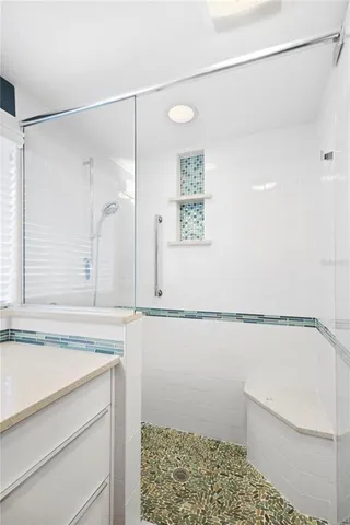 a bathroom with a toilet a sink and a window