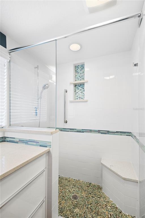 1950 Adams Lane Sarasota, FL 34236 - Photo 6 of 18 a bathroom with a shower and a sink