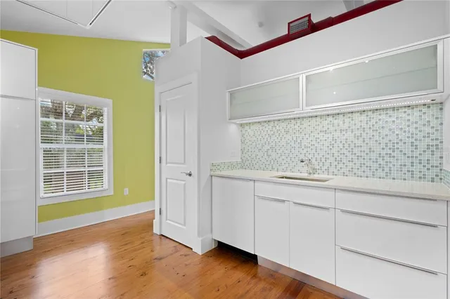 a view of a storage & utility room with washing machine