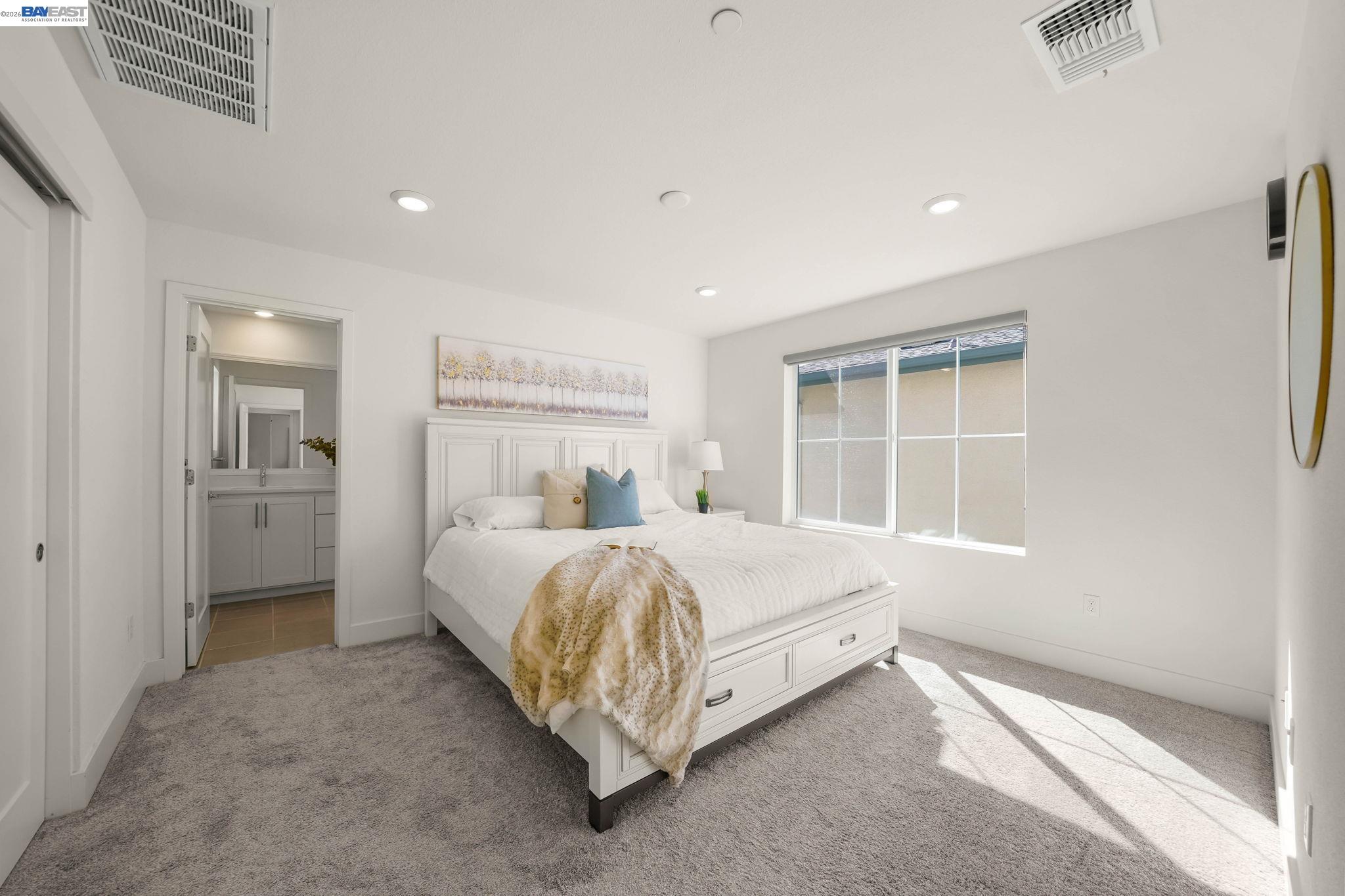 9034 Rudder Way Newark, CA 94560 - Photo 20 of 42 a bed room with a bed and a large window