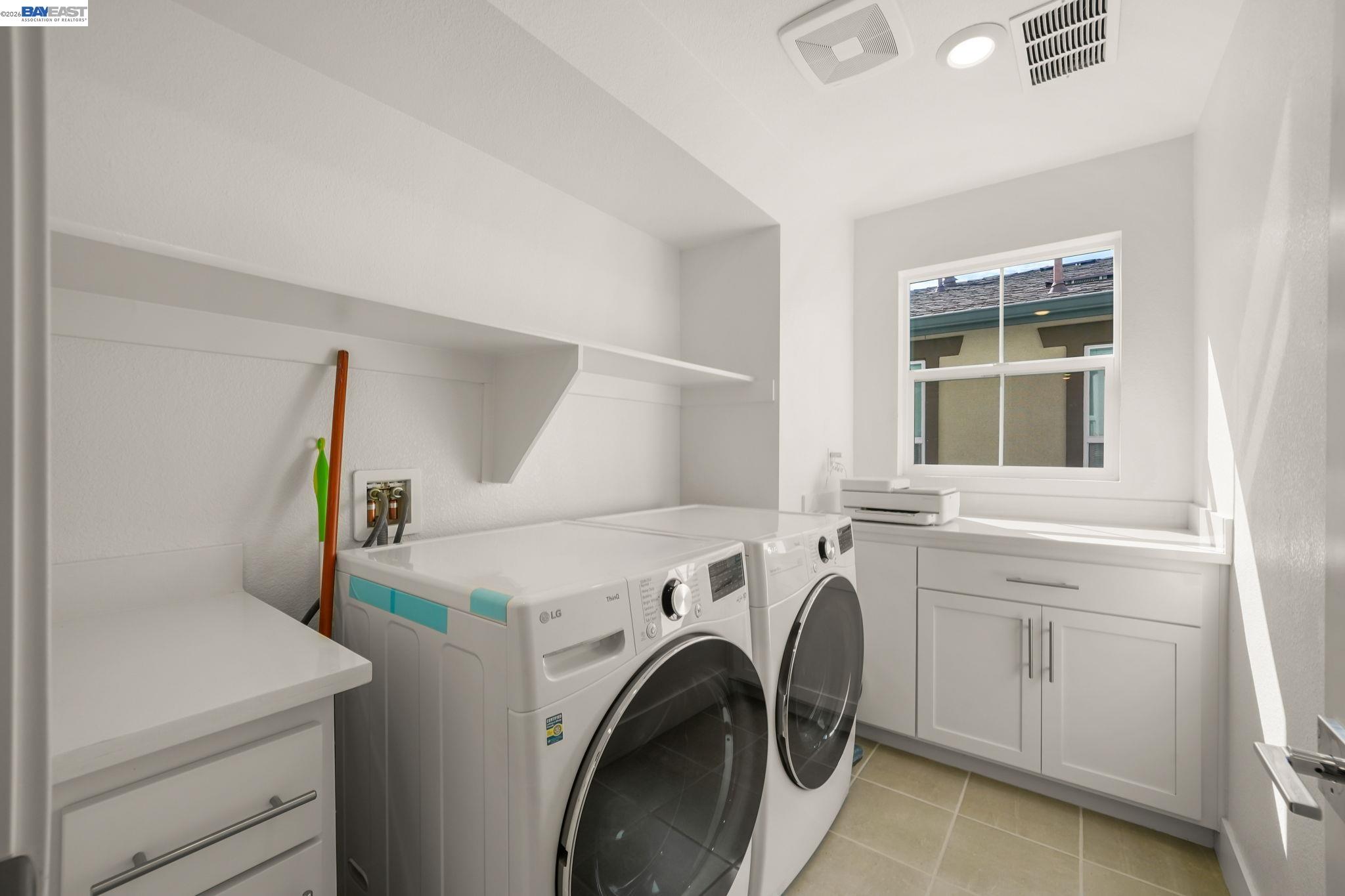 9034 Rudder Way Newark, CA 94560 - Photo 22 of 42 a utility room with dryer and washer