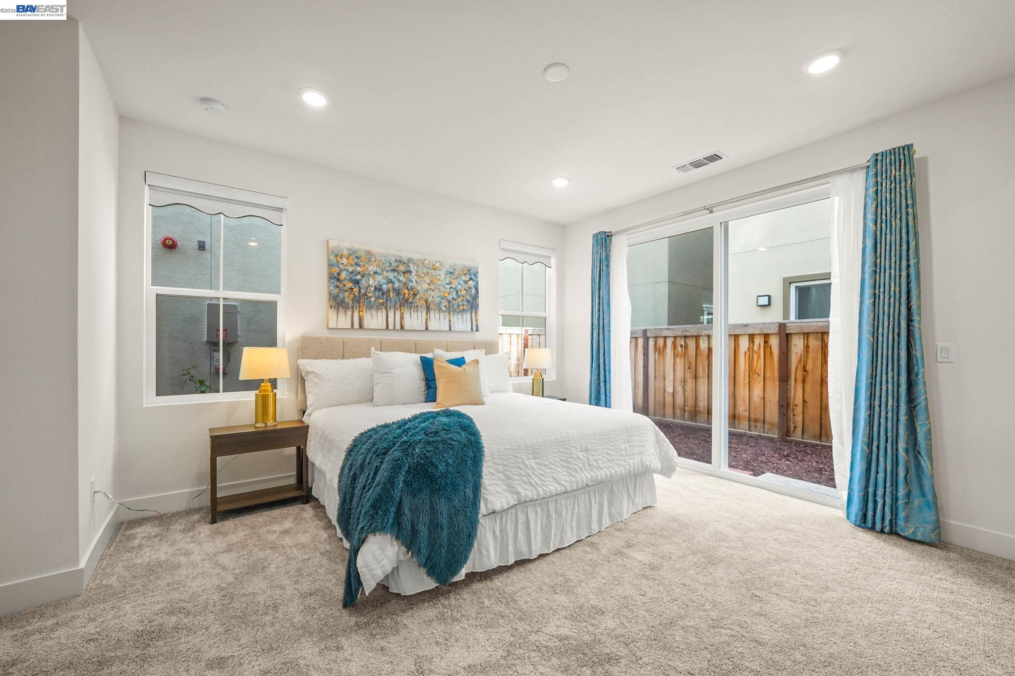 9034 Rudder Way Newark, CA 94560 - Photo 24 of 42 a bedroom with a bed and a large window