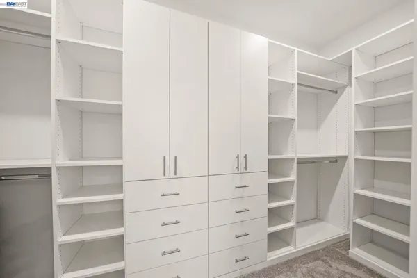 a view of an empty walk in closet