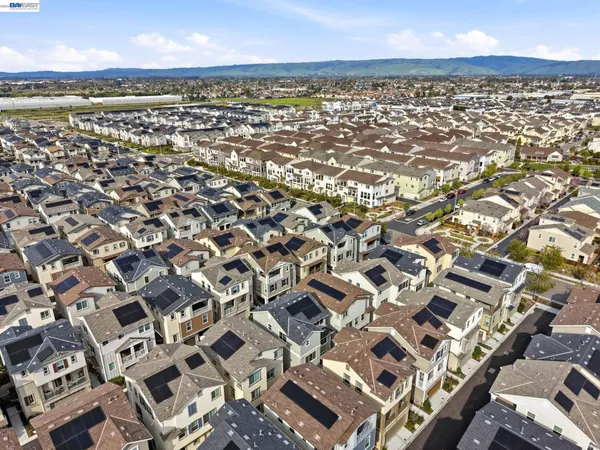 an aerial view of residential building with parking space