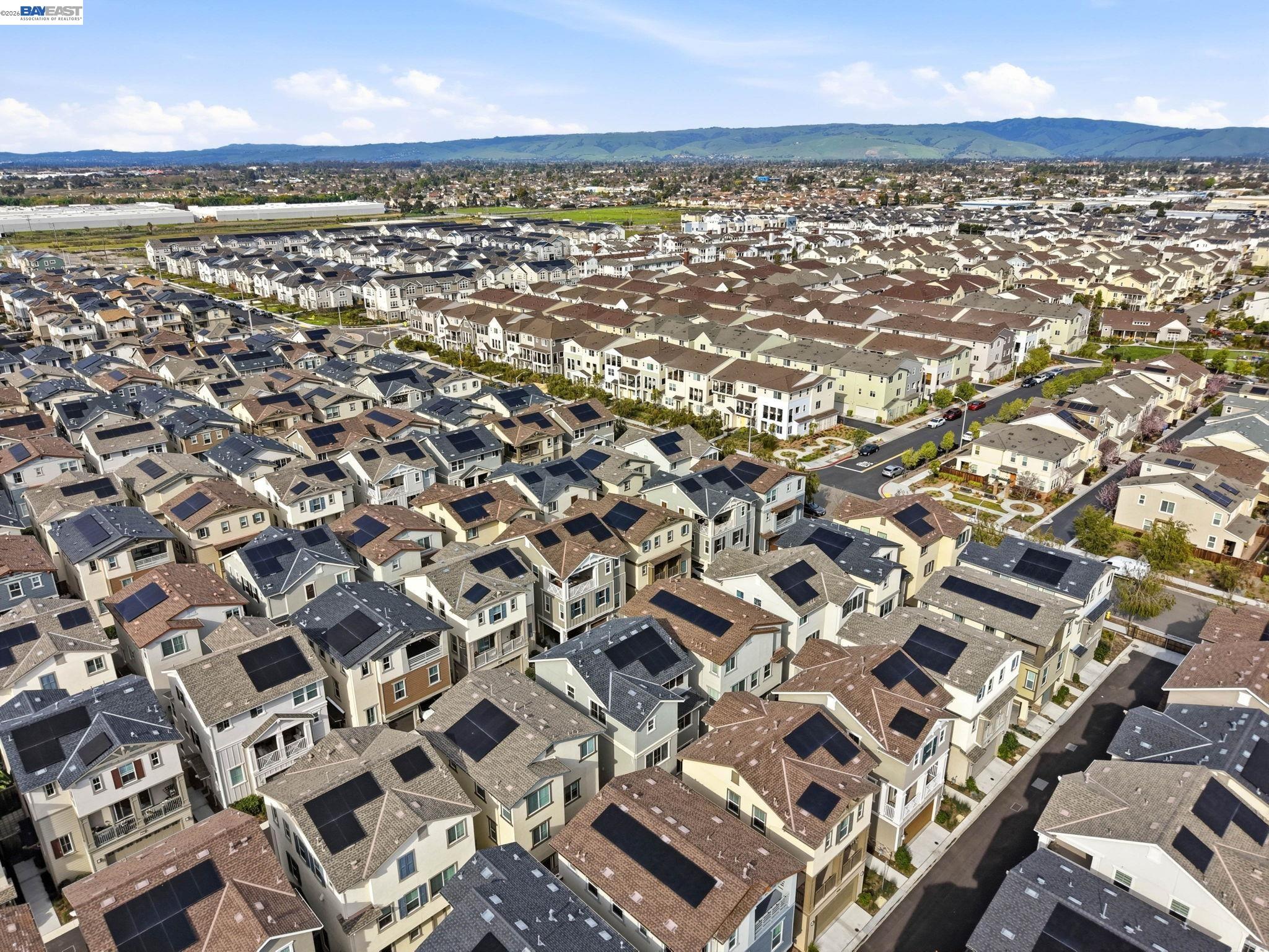 9034 Rudder Way Newark, CA 94560 - Photo 33 of 42 an aerial view of residential building with parking space