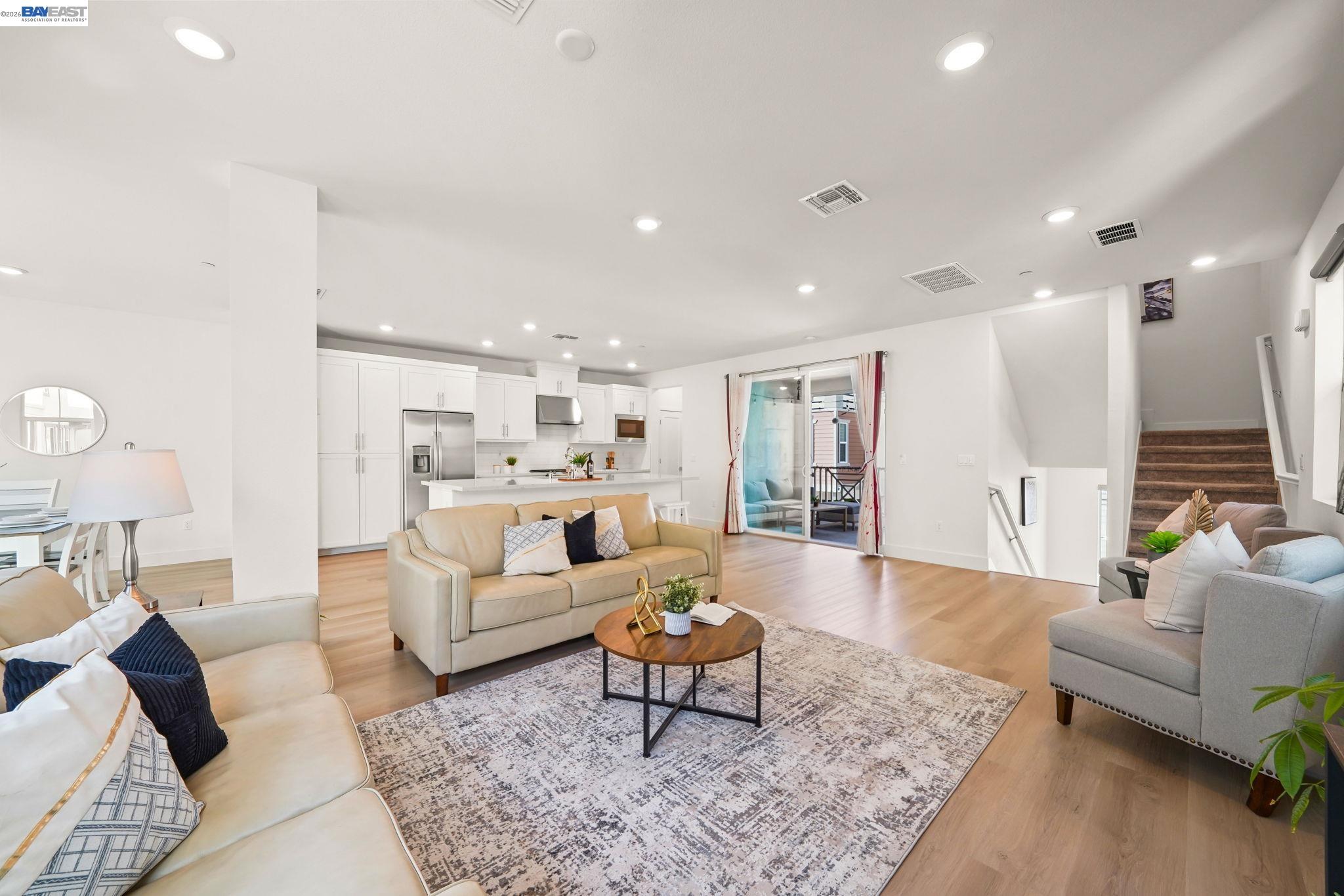 9034 Rudder Way Newark, CA 94560 - Photo 7 of 42 a living room with furniture and a rug