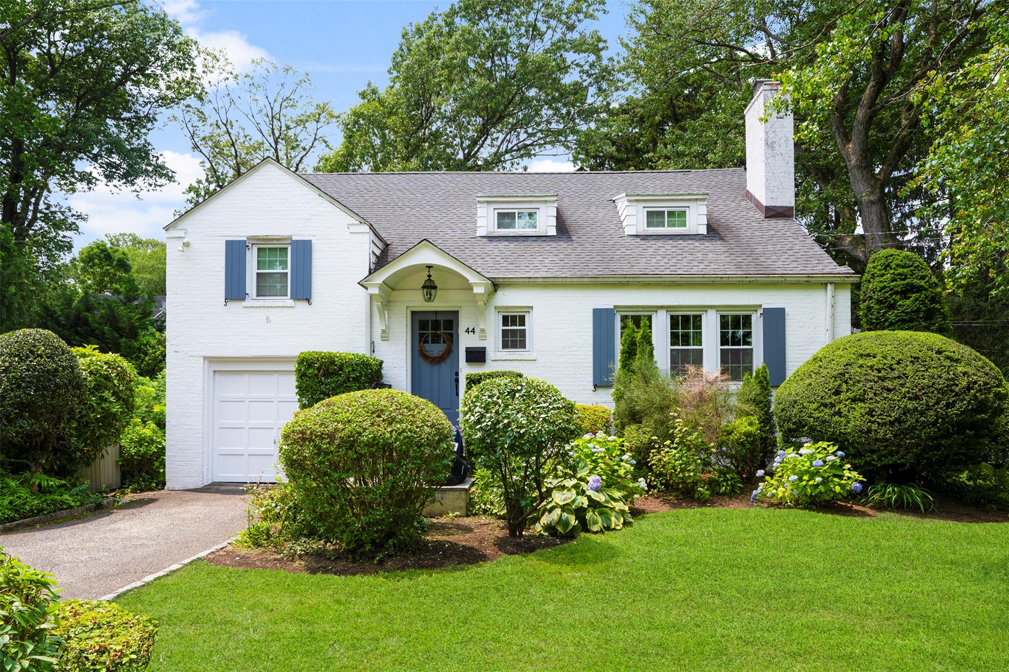 44 Kingsbury Road New Rochelle, NY 10804 - Photo 1 of 1 a front view of a house with a yard