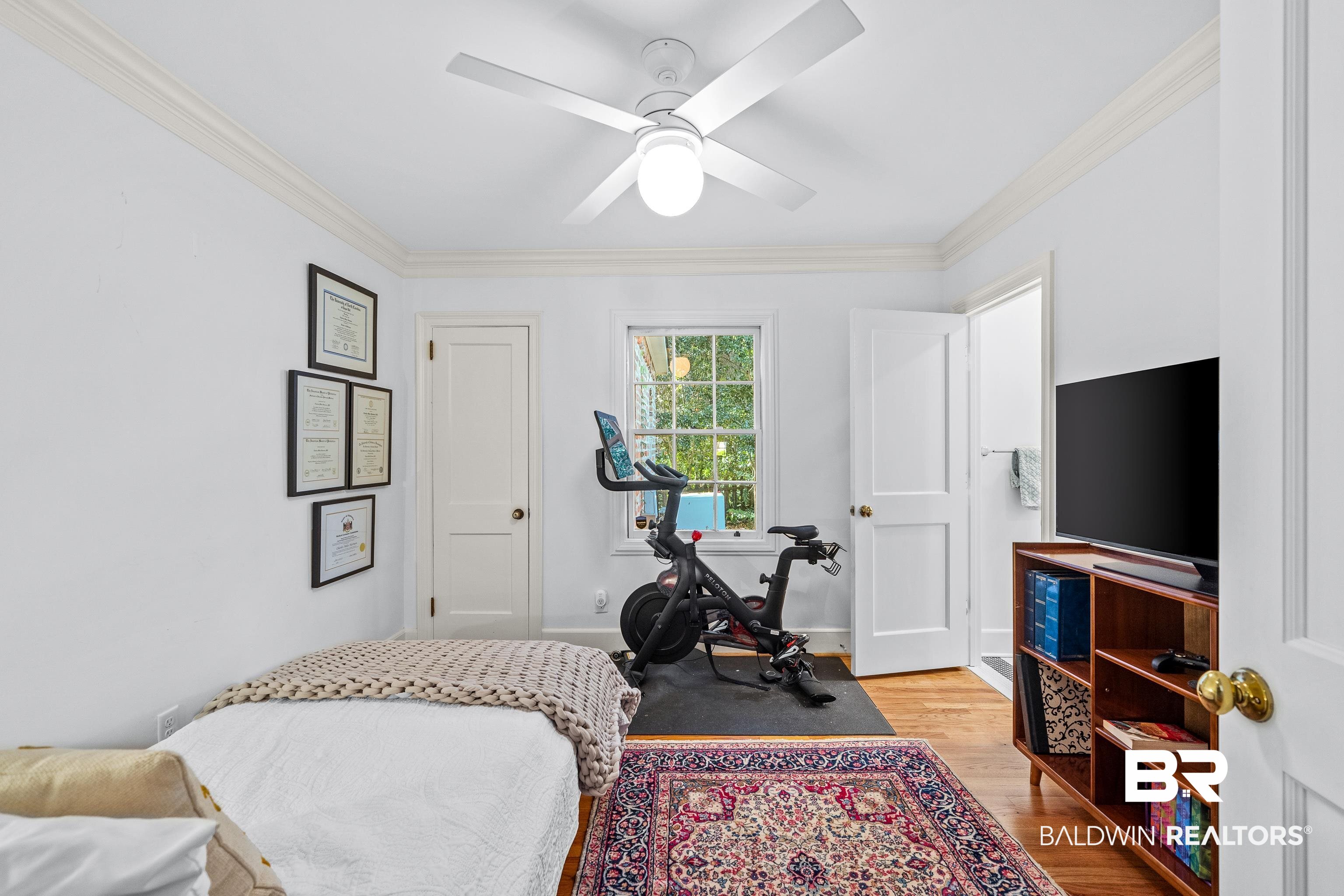 141 Myrtlewood Lane Mobile, AL 36608 - Photo 28 of 44 Bedroom featuring light wood finished floors, crown molding, and a ceiling fan