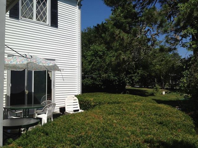 138 Third Avenue Hyannis, MA 02601 - Photo 19 of 27 a view of back yard of the house