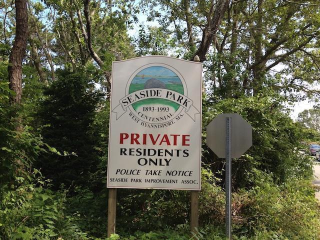 138 Third Avenue Hyannis, MA 02601 - Photo 25 of 27 a sign that is sitting on a brick wall