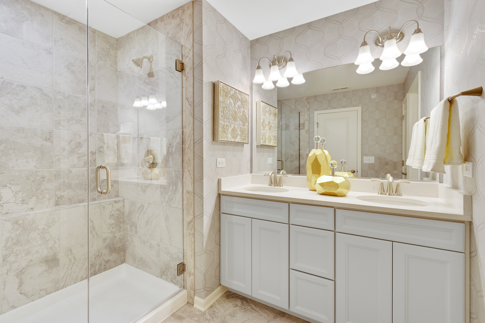 1998 Stuttle Road Batavia, IL 60510 - Photo 25 of 27 a bathroom with a double vanity sink mirror and shower