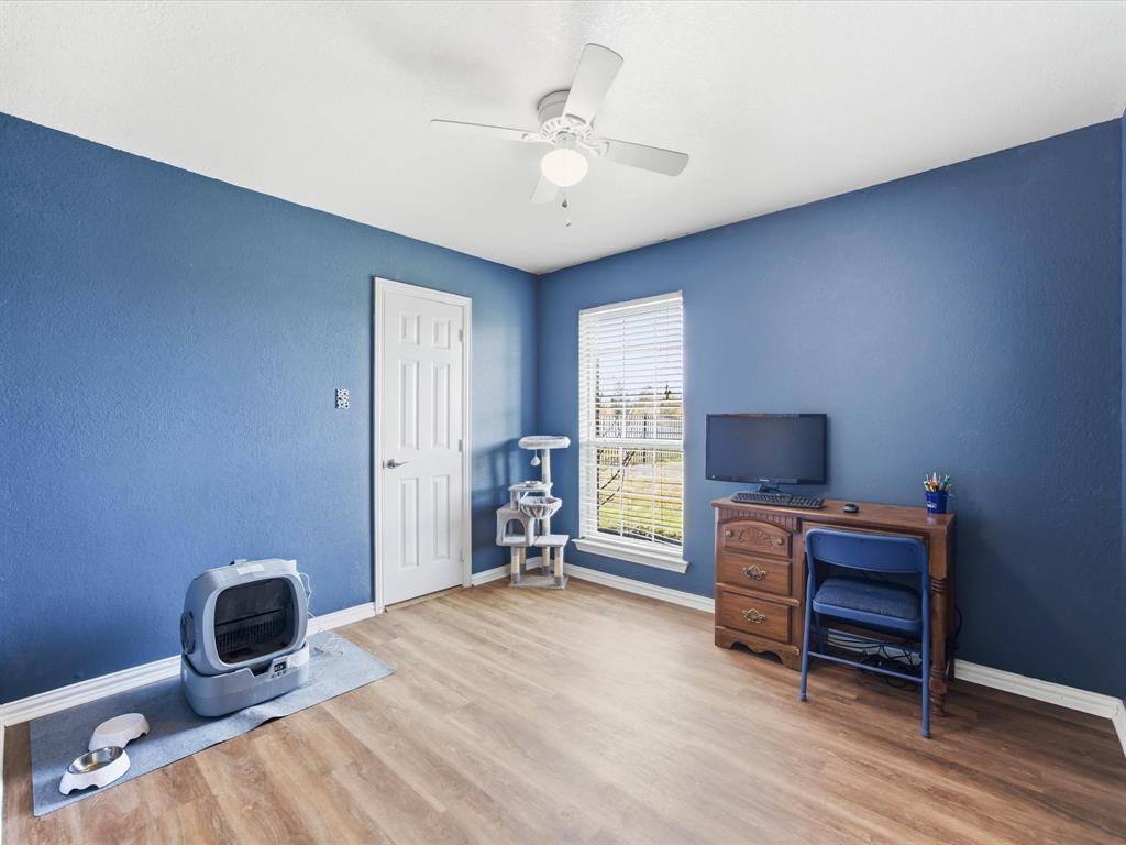 10000 Fireside Lane Forney, TX 75126 - Photo 12 of 40 Office with light wood finished floors and a ceiling fan