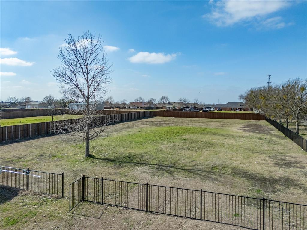 10000 Fireside Lane Forney, TX 75126 - Photo 6 of 40 View of yard with a residential view