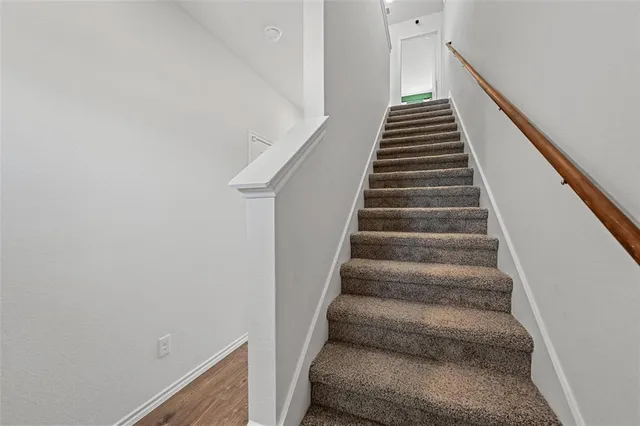 a view of a kitchen area with furniture and stove