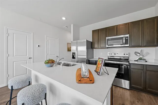 a bedroom with a bed and a mirror