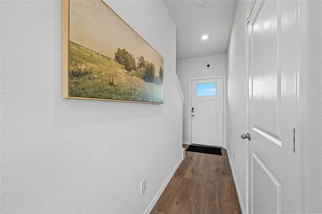 a kitchen with a sink and breakfast area