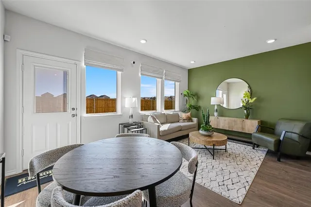 a kitchen with a stove microwave and refrigerator