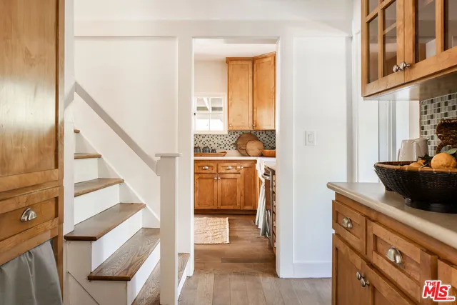 a view of a kitchen from the hallway