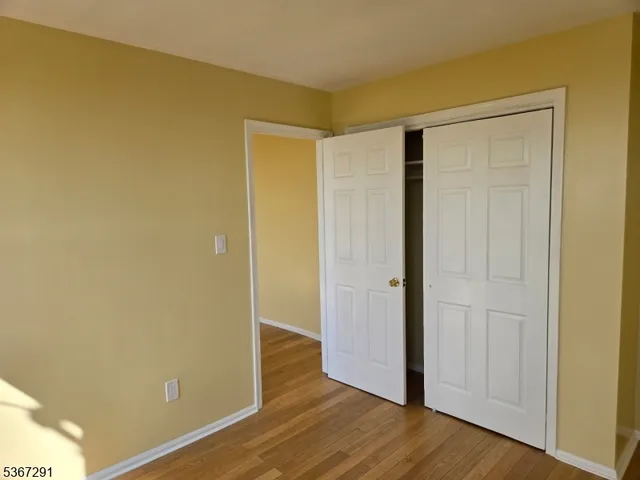 a kitchen with a stove and a refrigerator