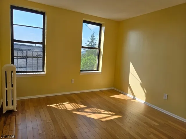 a view of a bathroom from a hallway